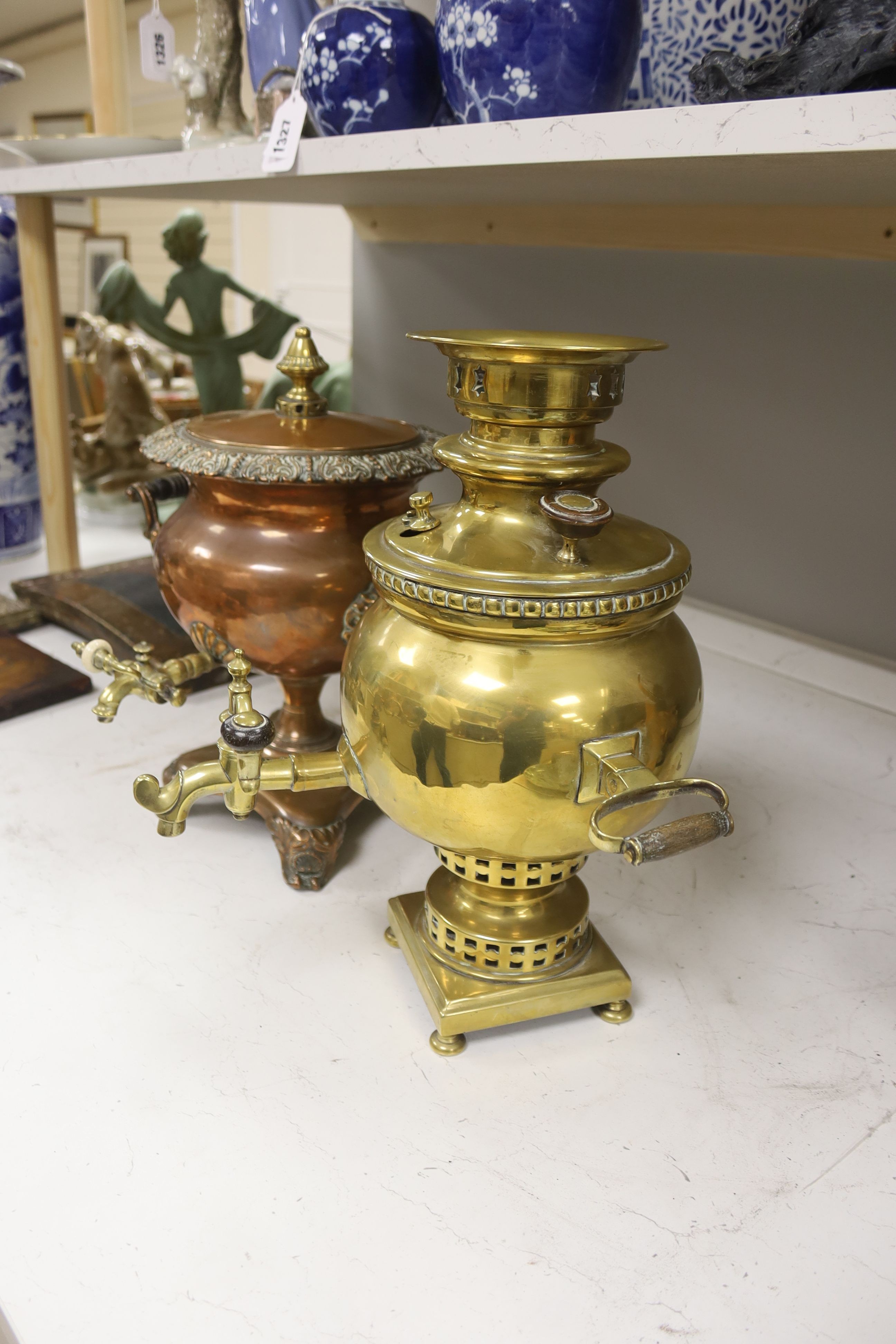 A brass samovar and a copper tea urn, height 37cm